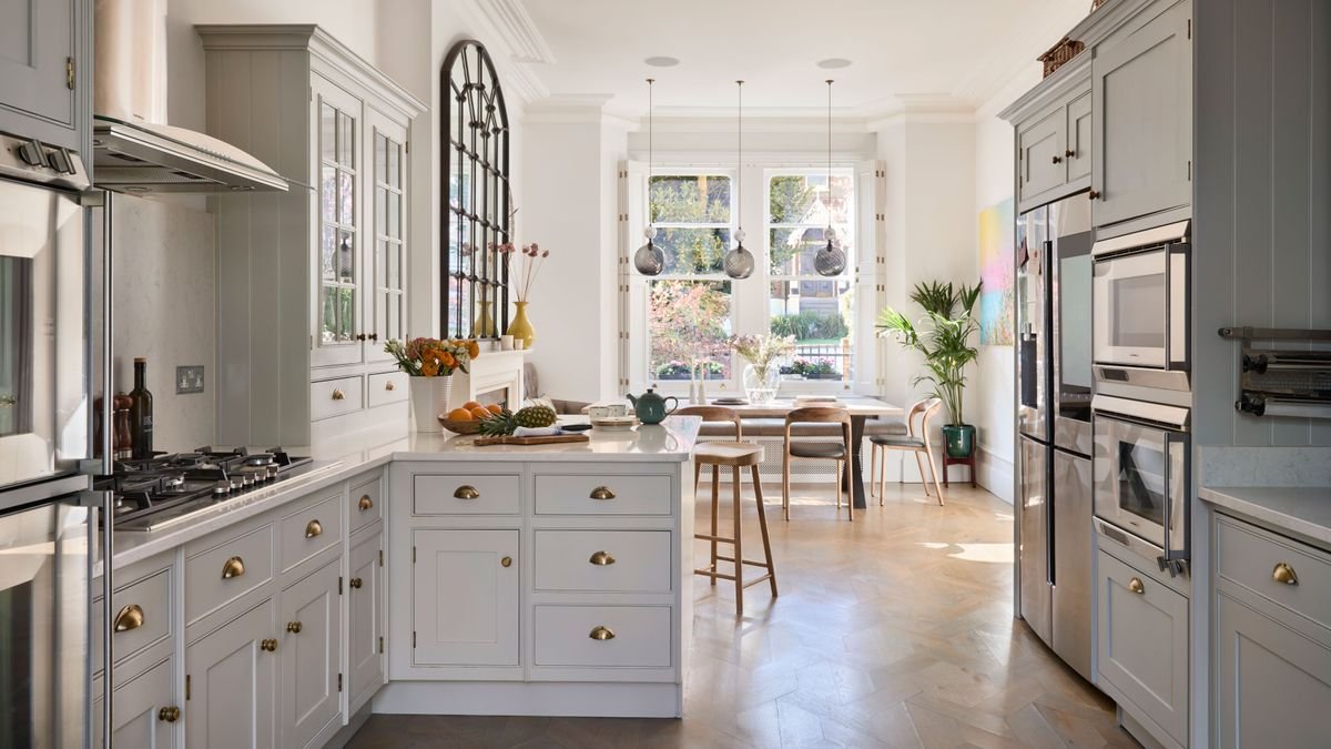 Flat-front light oak cabinets in a minimalist zen kitchen