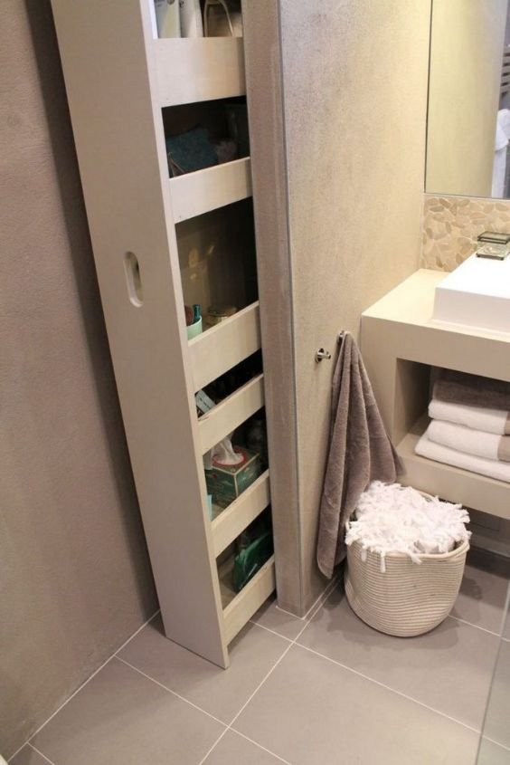 Hidden storage cabinets keeping kitchen countertops clear and calm