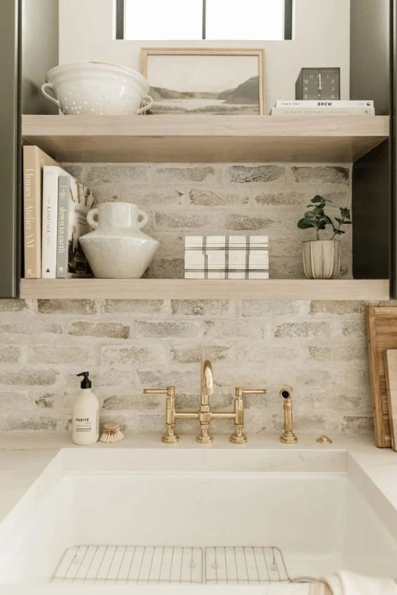 Natural stone tile backsplash in earthy tones for a zen kitchen