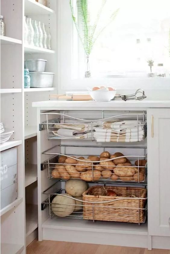 Deep pull-out kitchen drawers organized with bamboo dividers for zen efficiency