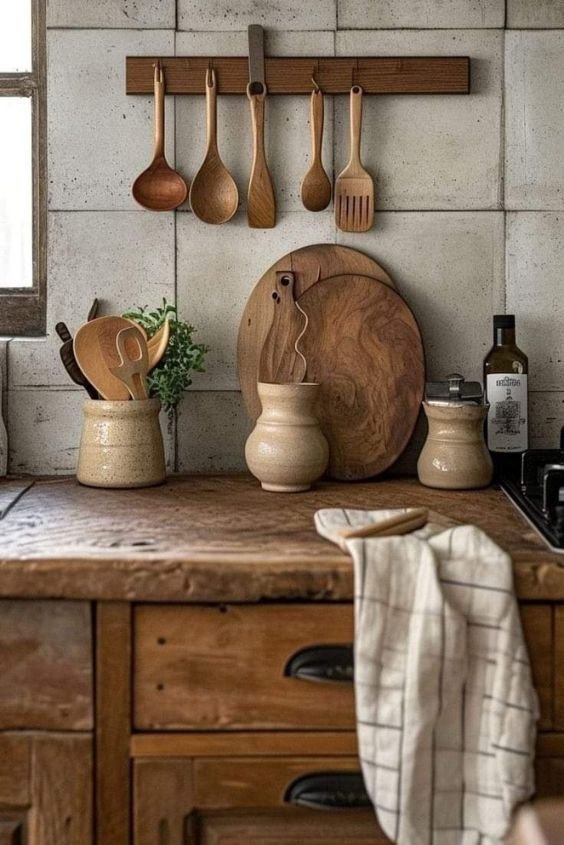 Wooden cutting boards displayed as wall art in a zen kitchen