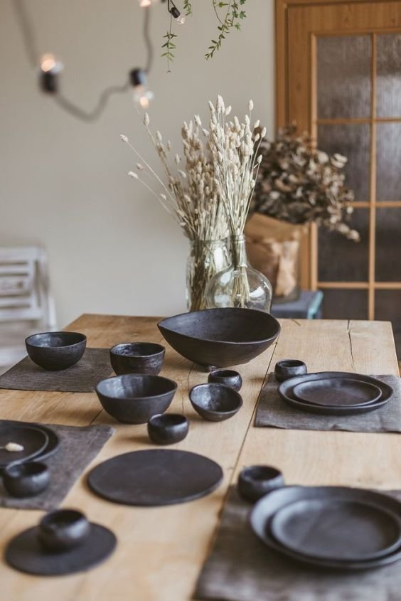 Zen tea corner with Japanese teapot and ceramic cups on a bamboo tray